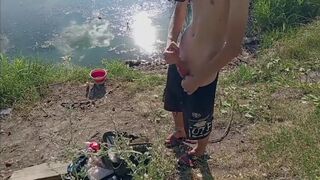 Guy jerking off in nature and fishing