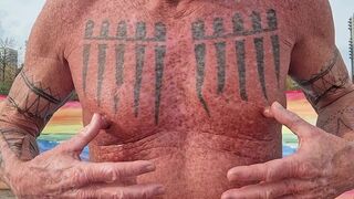 Playing with my nipples at the beach - 2 image