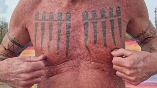 Playing with my nipples at the beach