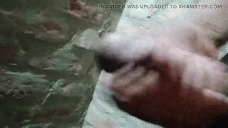 Gay guy spanking his cock in the bathroom