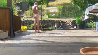 I take a cold shower in my garden and get sun dried