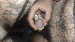 Masturbating wearing condom - 2 image