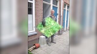great guy in waders, rubber boots, mud and overall