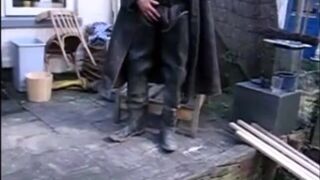 great guy in waders, rubber boots, mud and overall