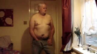Mature man strips and jerks off.