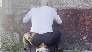 Kinky gentleman slave spread legs and plays with his ass in a car in public