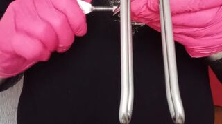 Inserting a Rectal Speculum while being in my Chastity Cage