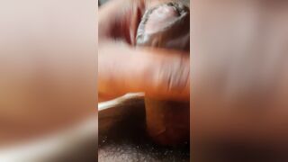 An Indian boy is experiencing personal enjoyment in his house.