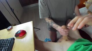 Watch Evgeny Twink & Alex Cute take turns milking a young stud's massive cock up close