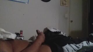 Chubby Menace rubs his oily hands on himself while massaging his chubby body