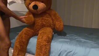 Watch Asafe Santtos take a massive black cock bareback in her teddy bear until he milked her up - 1 image