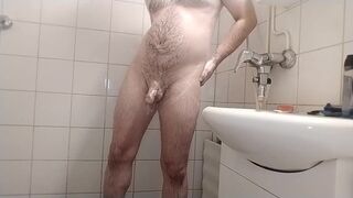 Uncut cock and balls shaved and showered in a steamy shower by horny chubby dude