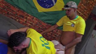 Watch as these Brazilian amateurs dominate their colleague's huge black cock during a soccer game! - 14 image