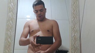 Danielbrasil98 jerks off to orgasm in bathroom with no mercy - 13 image