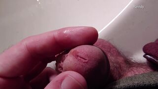 Watch me take a close-up view of my peehole while I pee in slow motion - 1 image