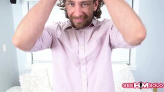 Jak Palmer moans in pleasure as he strokes his massive cock with two hands and rubs his muscle-bound abs - 1 image