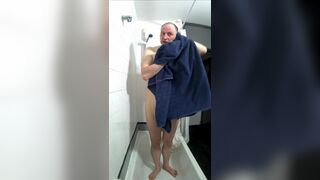 Kudoslong naked in the shower wanks his shaved cock he flaps it up and down and then slaps his penis