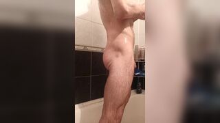 Guy washes himself in the shower showing muscles - 11 image