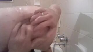 Destroying my man pussy in the shower - 1 image