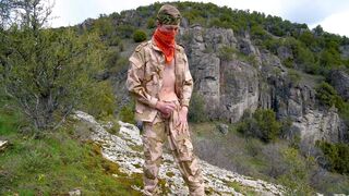 Soldier wanks himself on the mountainside on a warm spring day in the northern rocky mountains. - 11 image