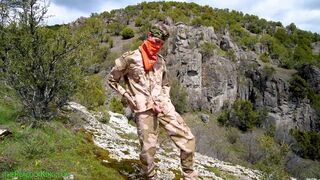Soldier wanks himself on the mountainside on a warm spring day in the northern rocky mountains. - 2 image