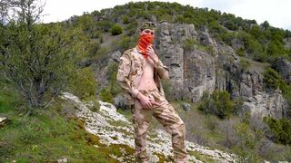 Soldier wanks himself on the mountainside on a warm spring day in the northern rocky mountains. - 4 image