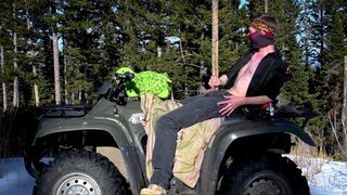 Biker fucks plush toy while on ATV four wheeler in the wilderness.