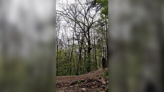 guy andkvcat in the woods on a dildo - 1 image
