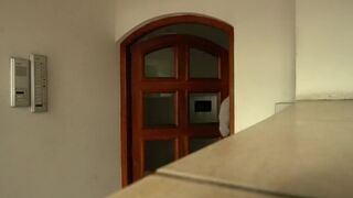 Athletic man from the public wants to spill hot milk