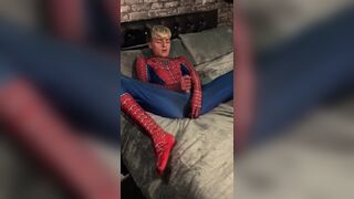 Spider-Man plays with anal beads and black dildo