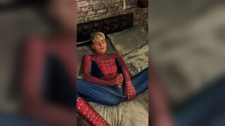 Spider-Man plays with anal beads and black dildo